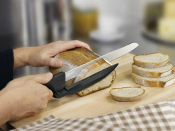 Couteau DUX VICTORINOX lame 21 cm avec Dispositif de Réglage pour Tranches